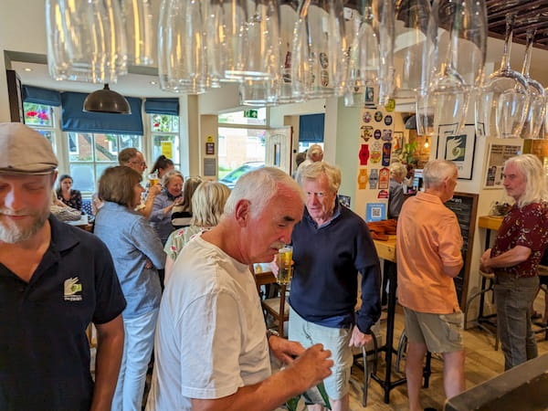 Locals having a chat in the bar.