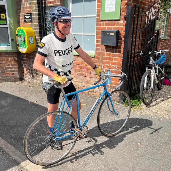 A mean lean cycling machine outside The Swan.