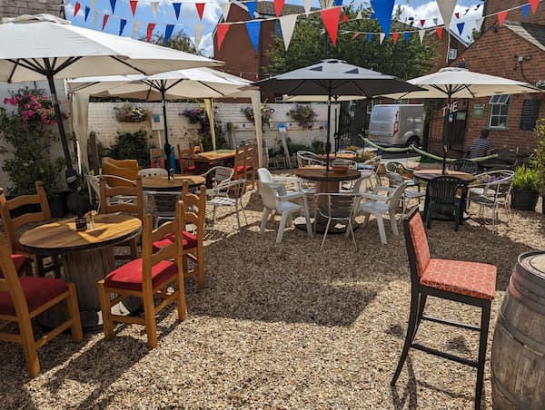 Decorated tables and chairs ready for the wedding party.