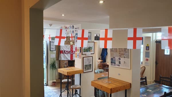 Inide the pub was decorated with England flags.