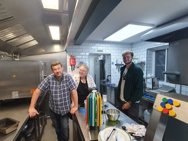 The volunteer kitchen team after tidy up