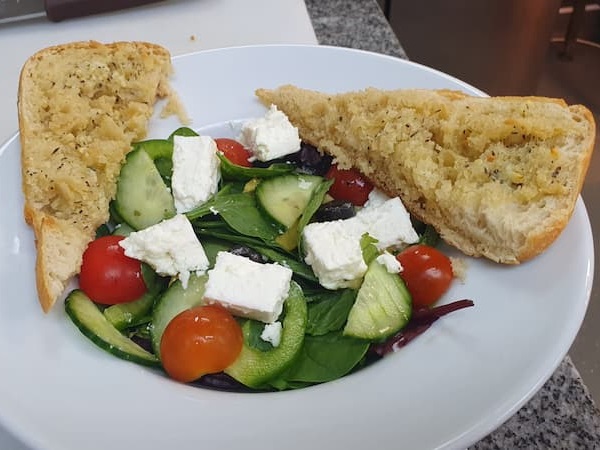 Salad with garlic bread