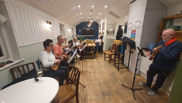 The Windsor Ukulele Group practicing for their next performance.