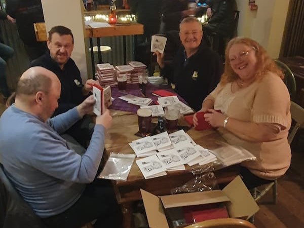Some of the Friends of The Swan packaging up the cards.