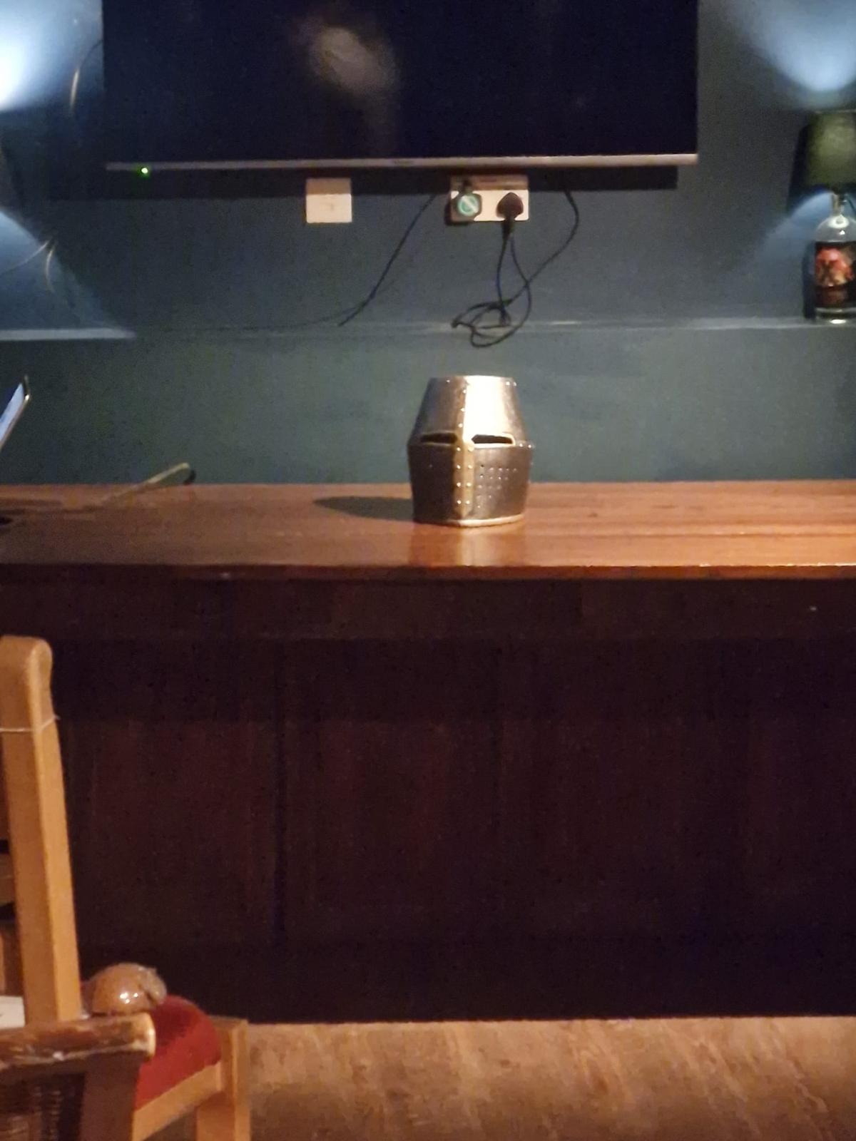 Knight Helmet underneath the TV