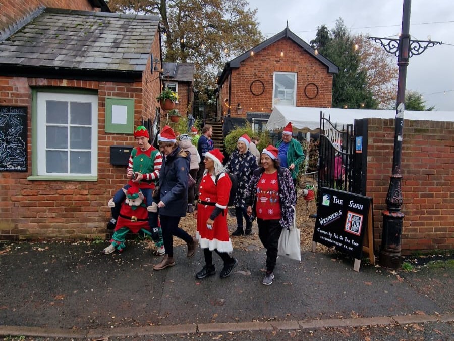 More wlakers leaving through the main gates.