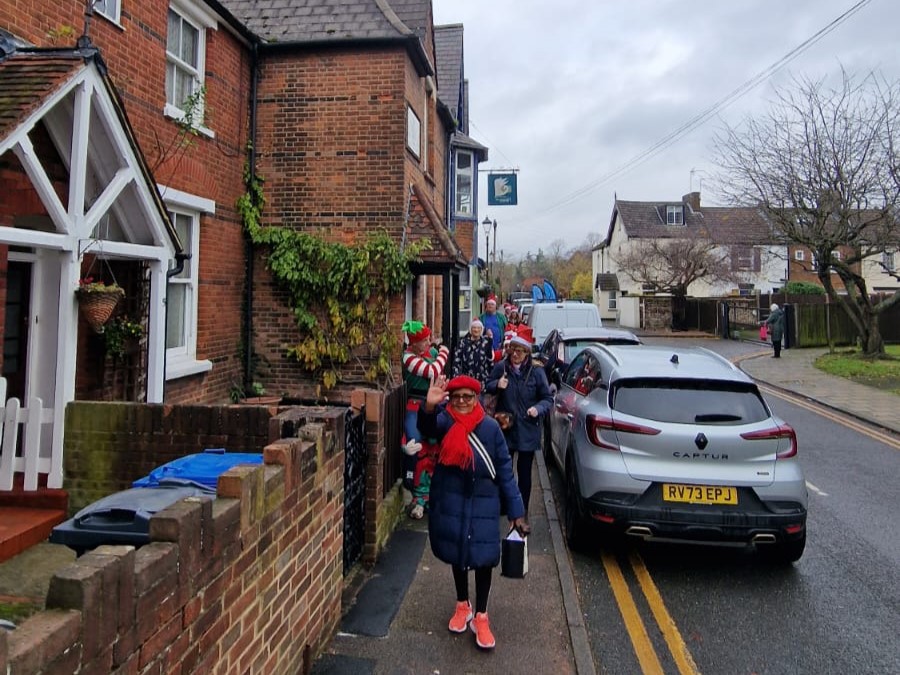 Walkers passing The Swan.