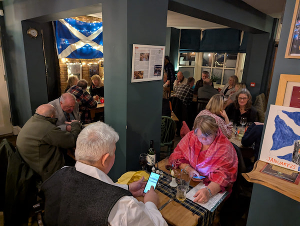 Scots flags dressed the Pub