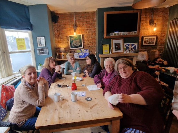 One of the big tables full of supporters.