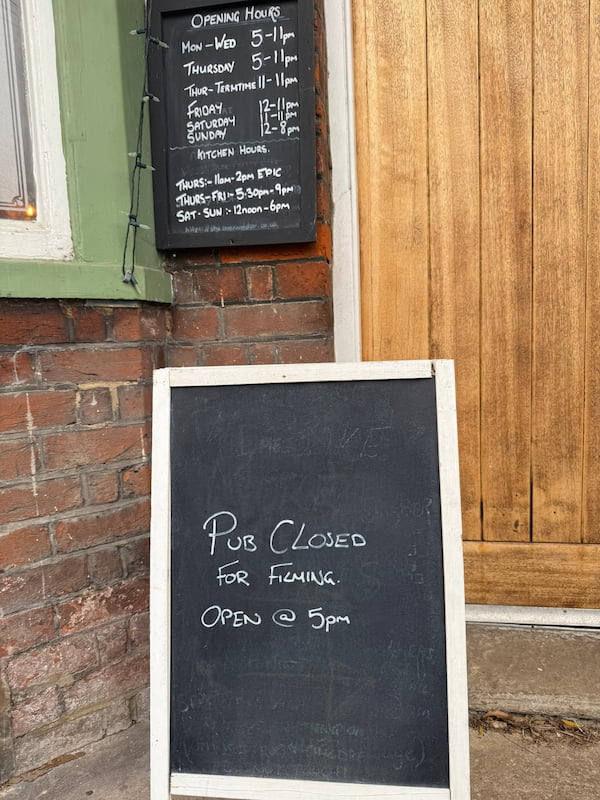 Pub closed for filming sign