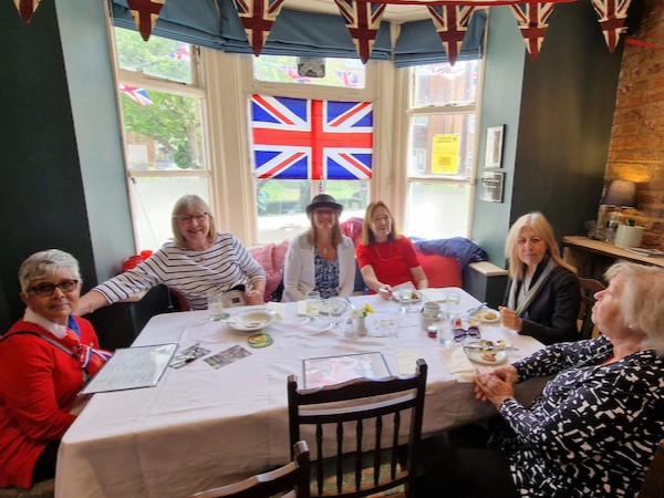 The big table with Mirella and friends at VE Day 80