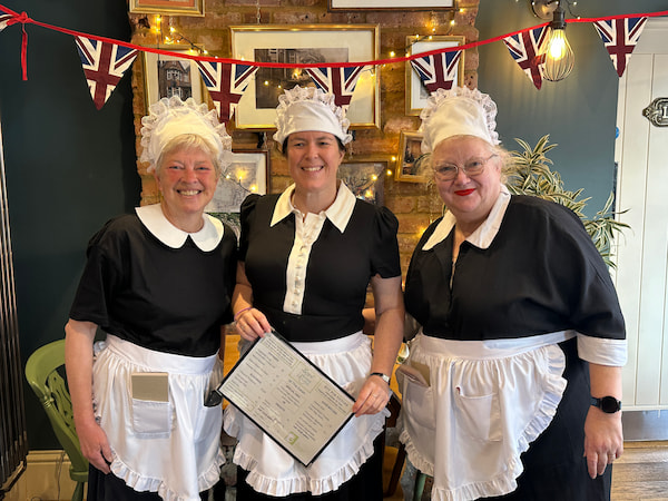 Our VE Day 80 waitress - Trudy, Anne and Louise - in the bar