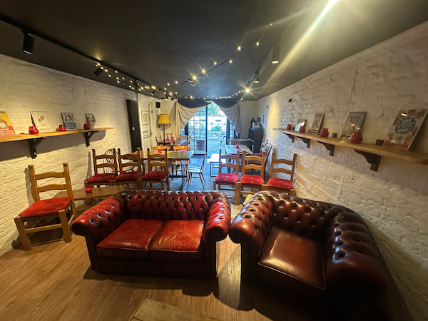 Comfy sofas in the Coach House for watching our selection of war films for VE Day 80