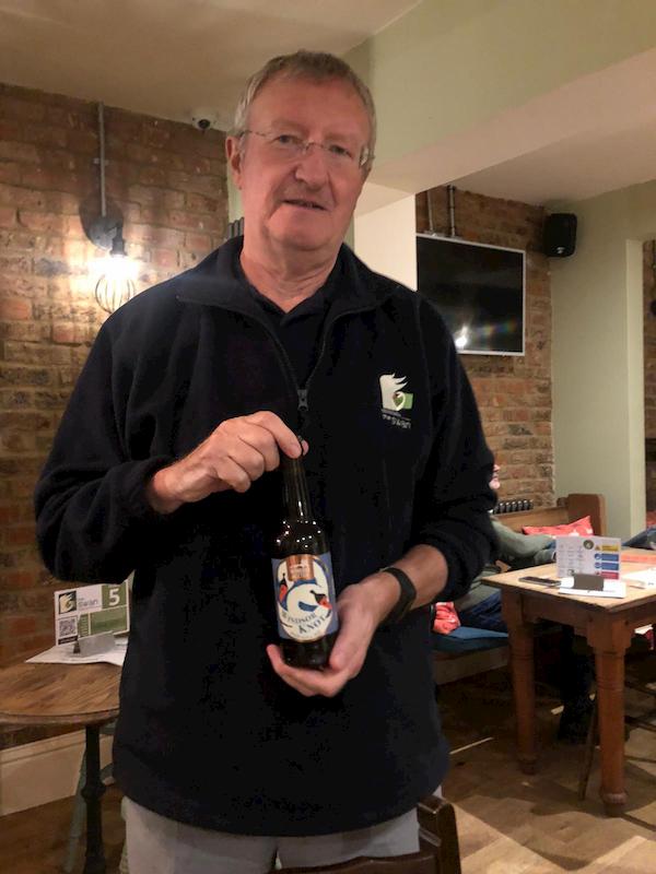 Peter with his winning bottle of beer