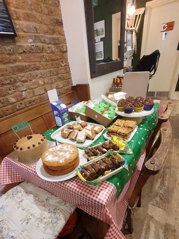 Table covered with cakes, thanks to all our bakers