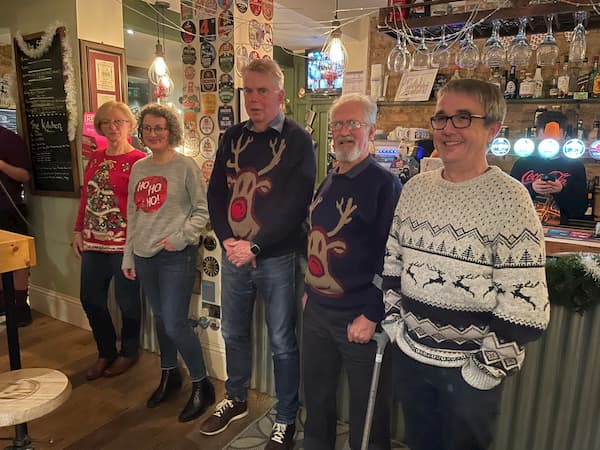 Five contenders for the Christmas Jumper competition.