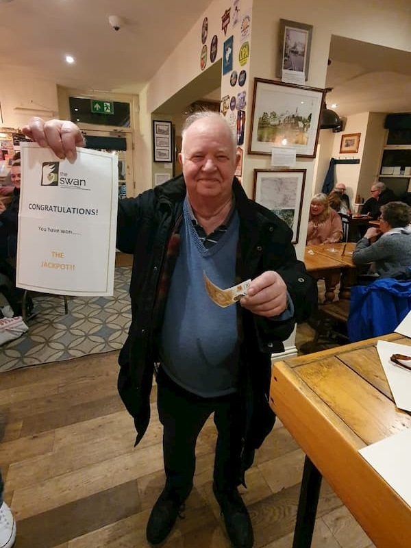 Nigel with his certificate and tenner.
