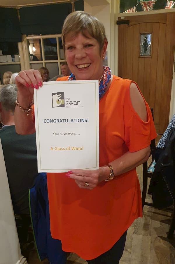 Sheila Allen with her Glass of Wine certificate.