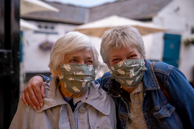 Two of the supporters looking chuffed (behind masks)