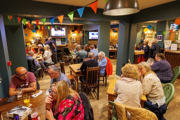 The calm in the pub before the awards ceremony.