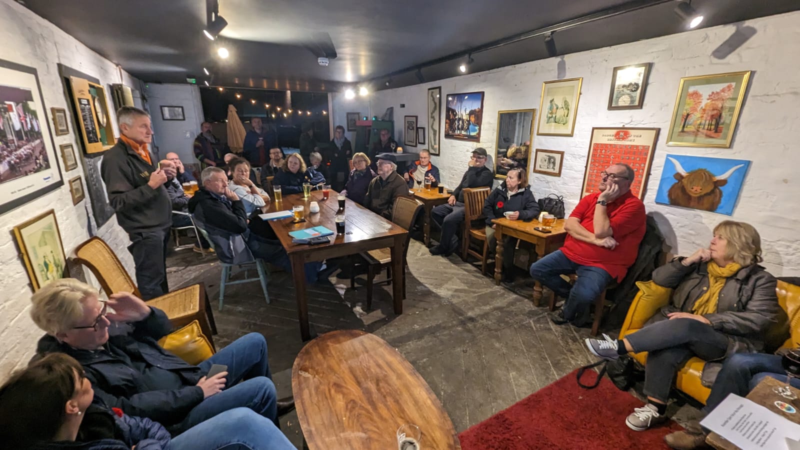 Attendees at the first forum inside The Coach House.