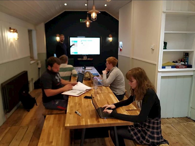 Students studying in the School House