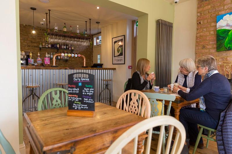 People enjoying a coffee