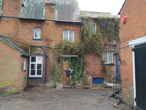 Patio gone, side of the pub looks better