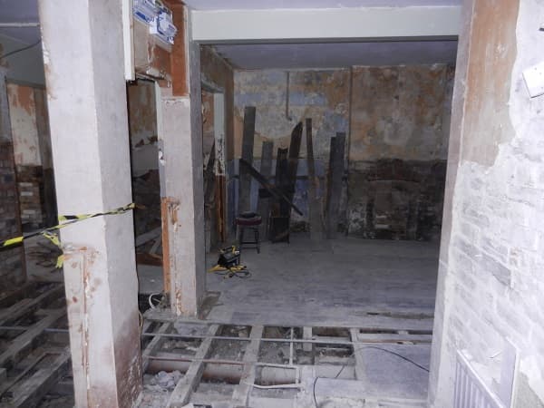 View from side door into the pub - floor looks rotten