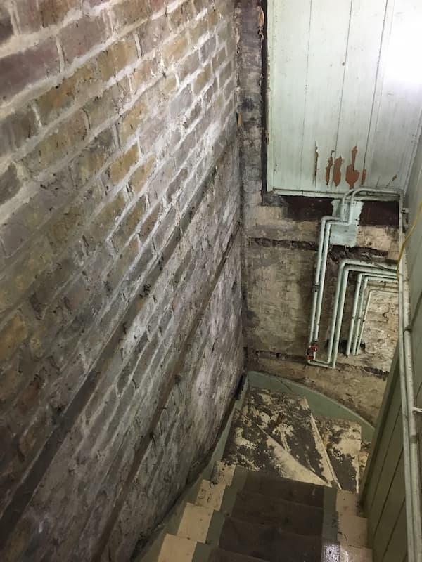 Looking down the stairs from the school room