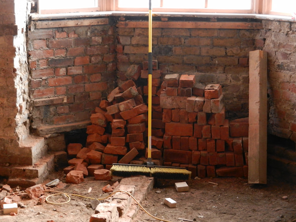 Bricks piled up in one of the alcoves