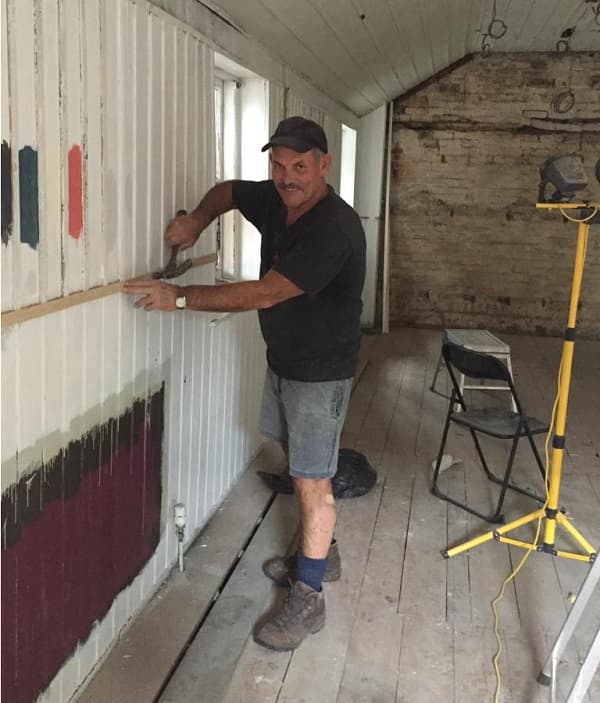 John prepping the school room