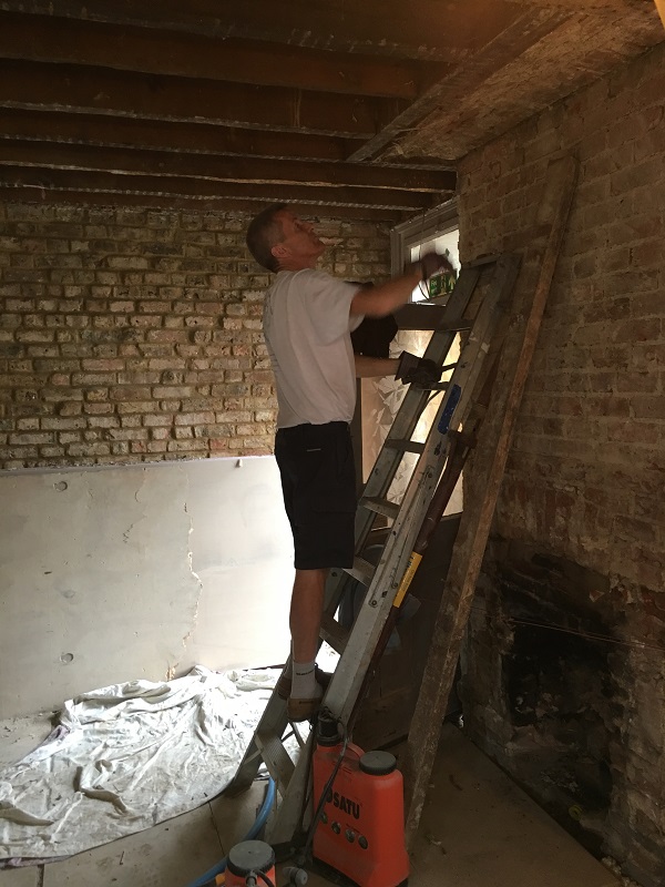 Removing the nails from the rafters