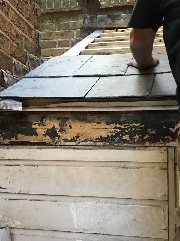 Slating the side entrance