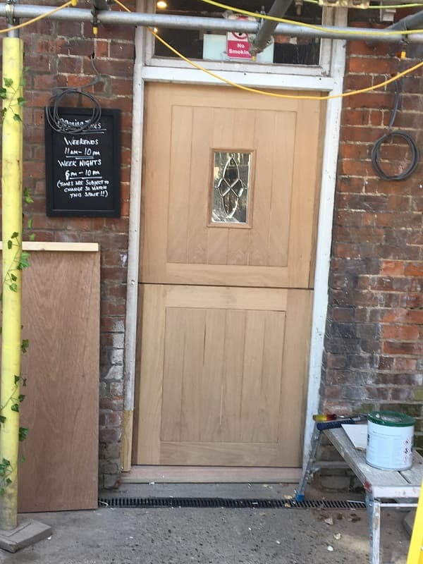 Replacing old rotten door at the bar