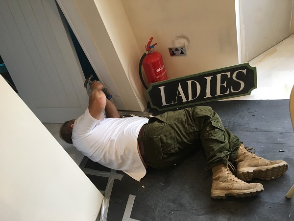 Pete adding the outer ladies fire door