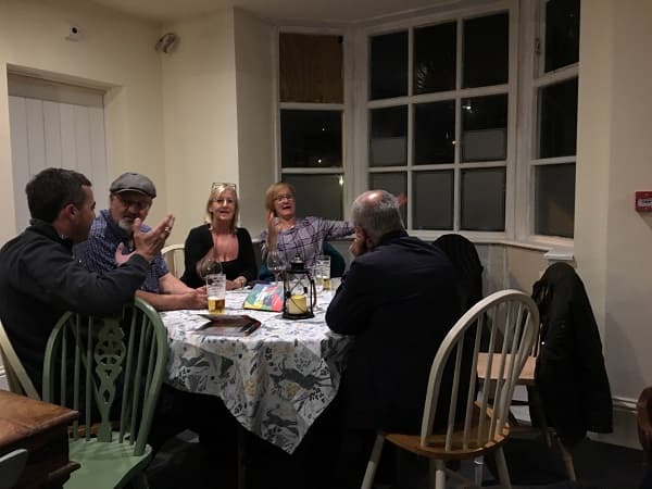 Volunteers having a few drinks on a Friday evening