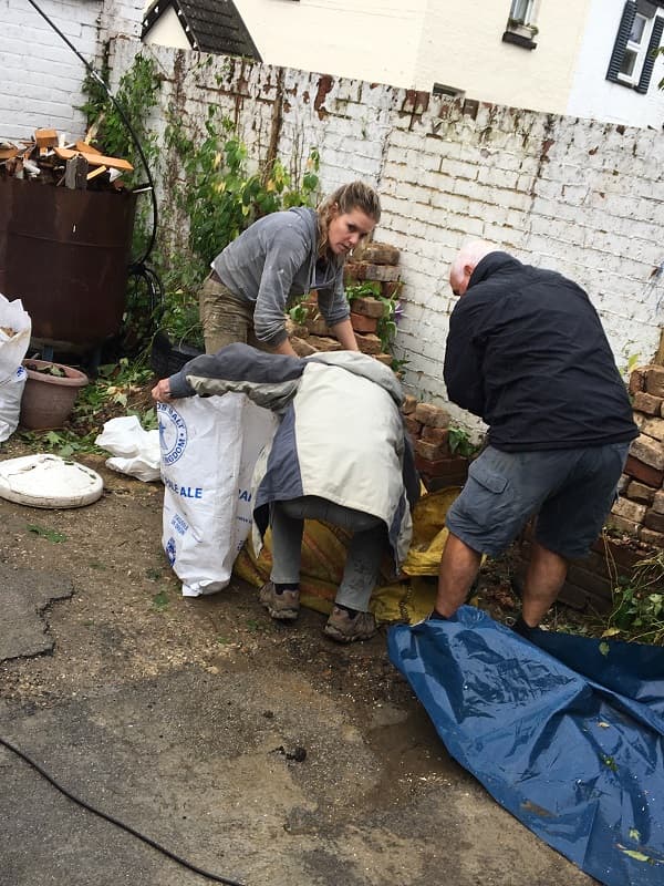 Moving the rubble at the front of the yard