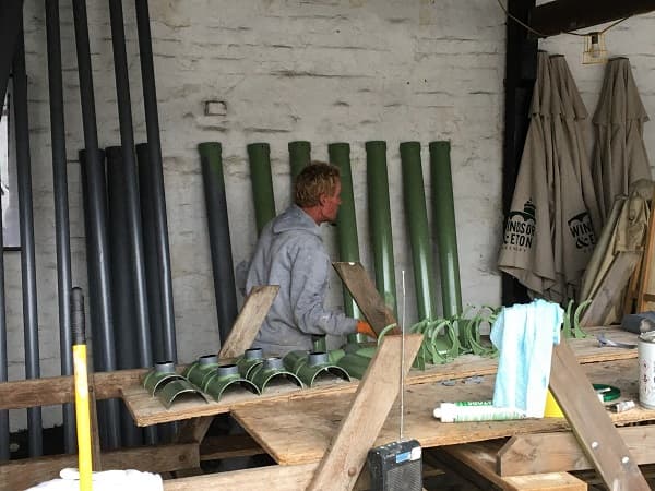 Painting underneath the lean-to due to the weather