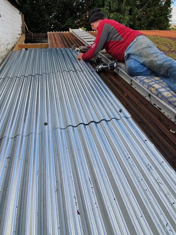 New aluminium panels on the lean-to roof