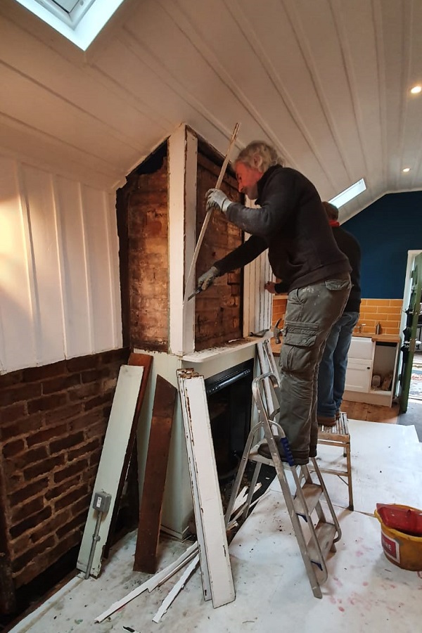 Tony removing the facia to the chimney breast