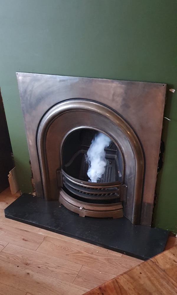 added the slate hearth installed, smoke testing underway