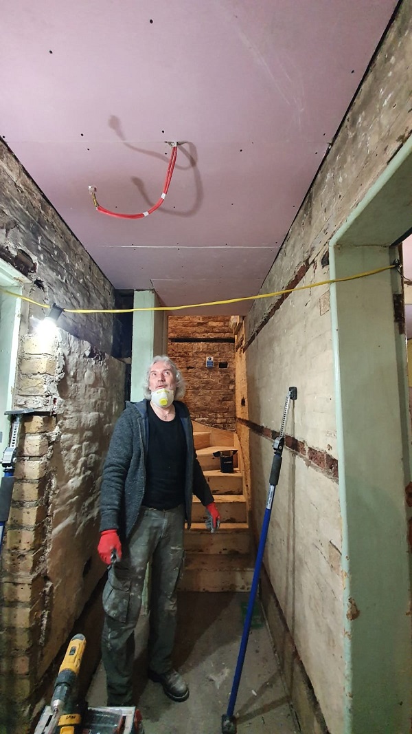 Tony admiring his new fireboarded corridor