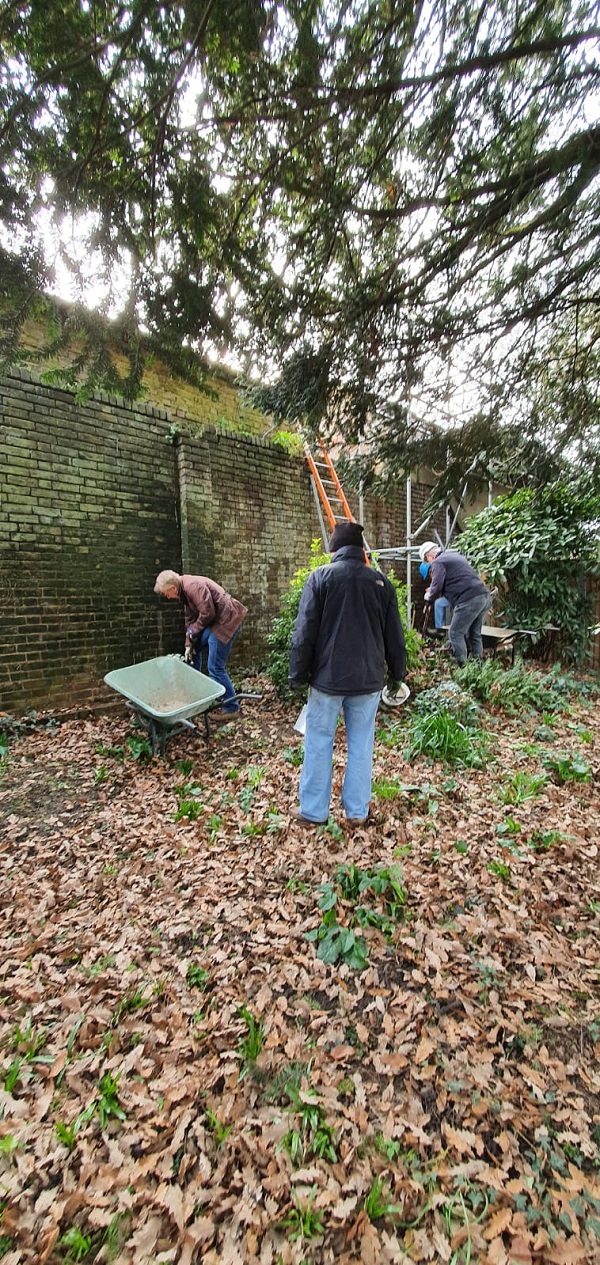 Clearing debris away from The Kitchen wall