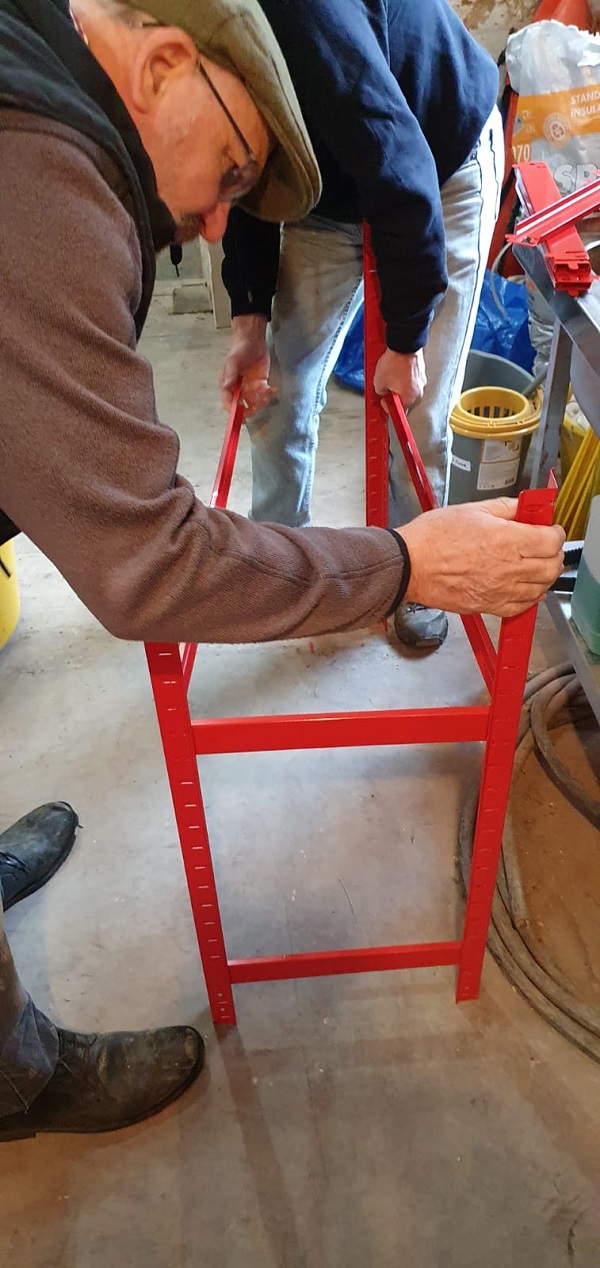 Guys putting the shelving together