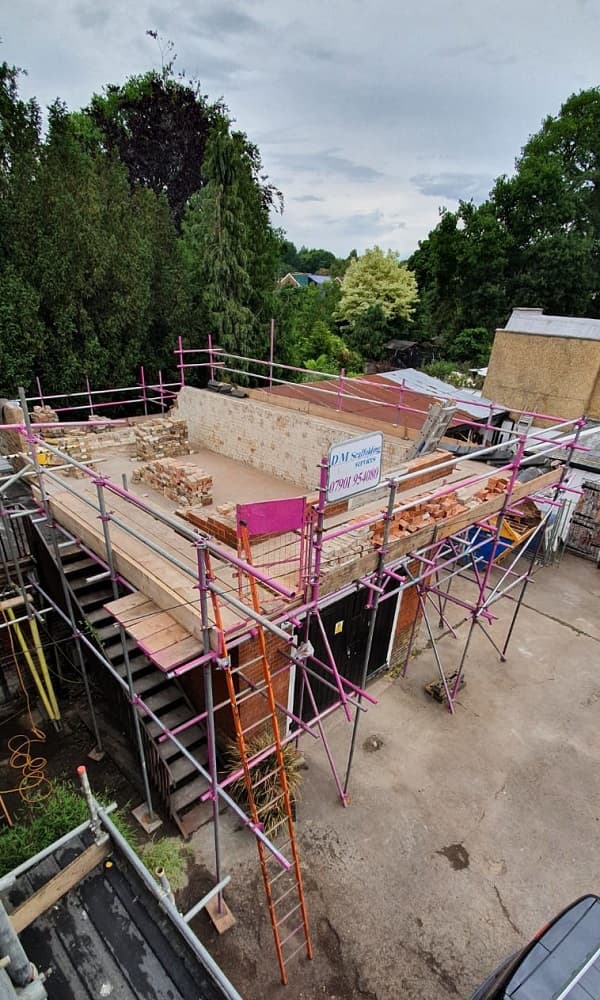 View from the bedroms of the pub down at the coach house, no roof and virtually no first floor