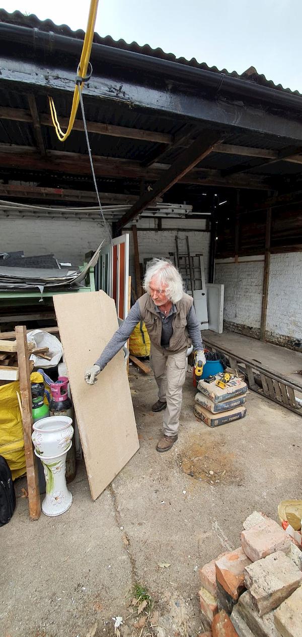 Tony clearing out the subbish from The Courtyard