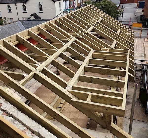 Showing the work going on in front on The Coach House