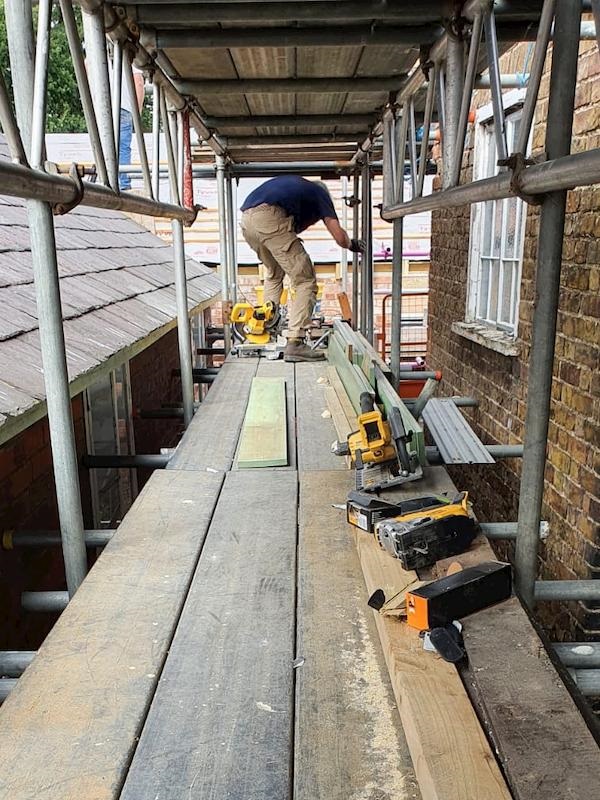 Tony putting up soffits and barge boards