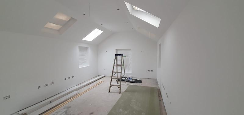 Facing the front of The Coach House after plaster had been misted